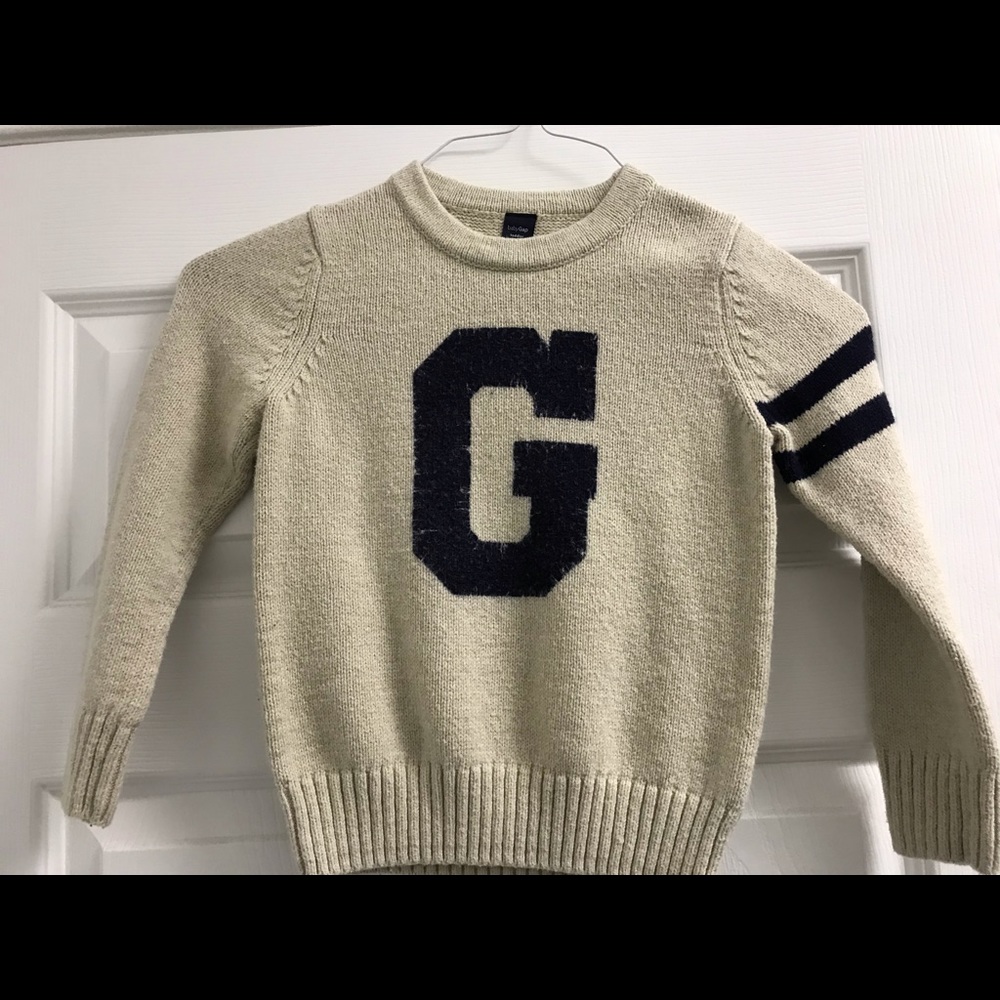 GAP tan and navy sweater.